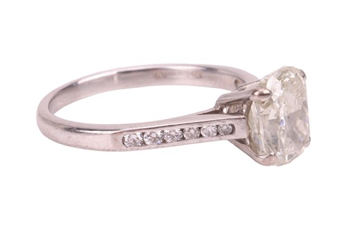 Lot A diamond solitaire ring in 18ct white gold,...