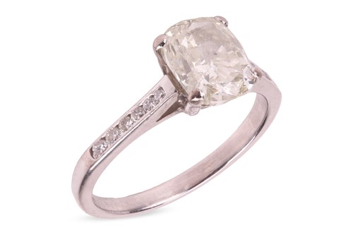 Lot A diamond solitaire ring in 18ct white gold,...