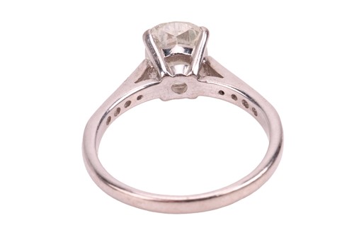 Lot A diamond solitaire ring in 18ct white gold,...