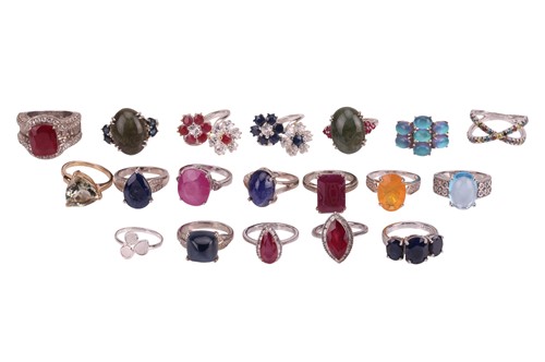 Lot 57 - A large group of nineteen gem-set rings, in...