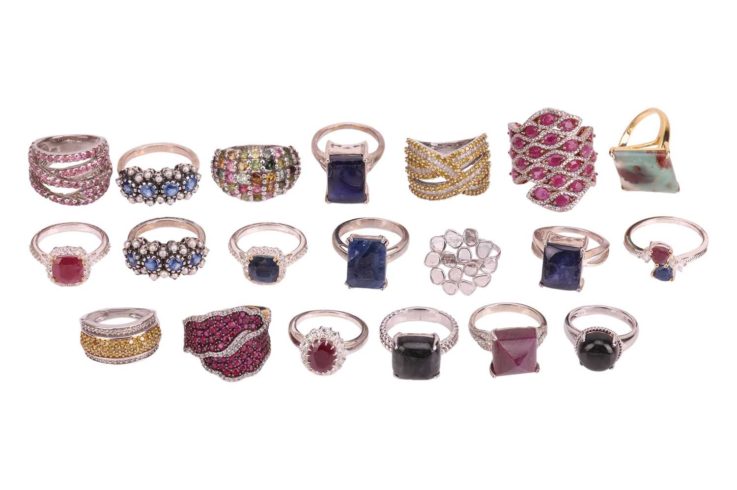 Lot 12 - A group of twenty gem-set rings, in silver or