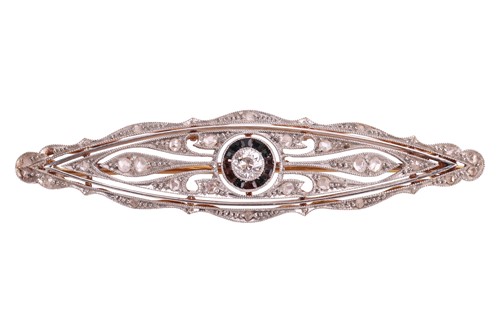 Lot An early 20th century gem-set plaque brooch,...