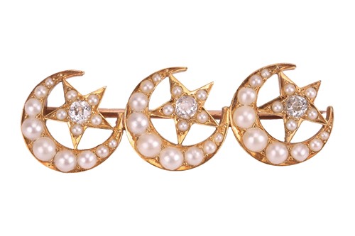 Lot 50 - A split pearl and diamond-set crescent moon...
