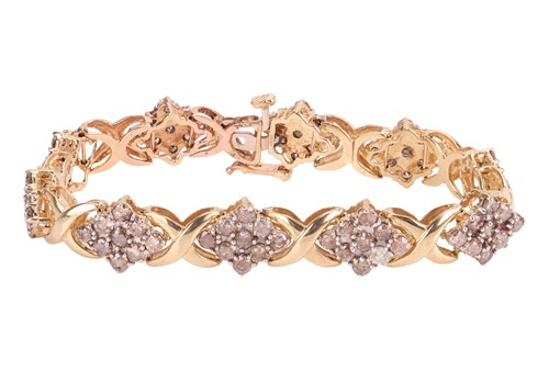 Lot A diamond-set bracelet, composed of diamond...