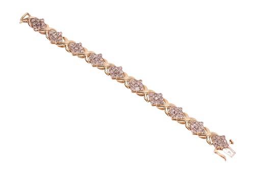 Lot A diamond-set bracelet, composed of diamond...
