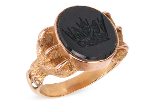 Lot A signet ring with naval crown intaglio, the...
