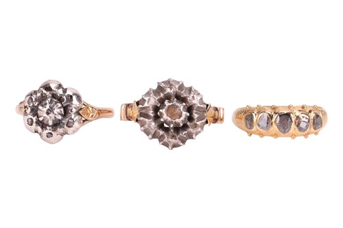 Lot 30 - A group of three rings; The first a...