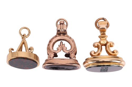 Lot 33 - Three fob seals; The first a bloodstone seal,...