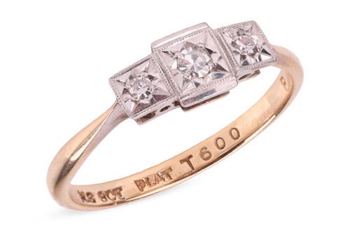 Lot 50 - A three-stone diamond ring, star-set with...