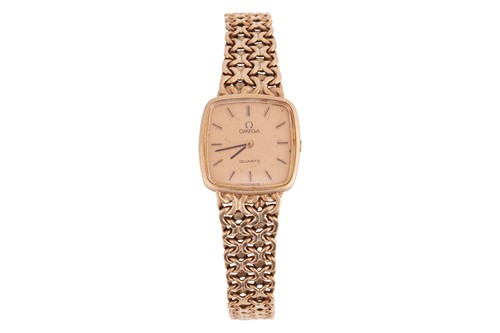 Lot Omega – A 9ct Gold Dress Watch Bezel: Smooth...