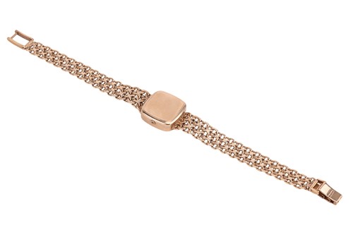 Lot Omega – A 9ct Gold Dress Watch Bezel: Smooth...