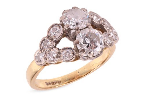 Lot 107 - A diamond dress ring in 18ct gold, with an...