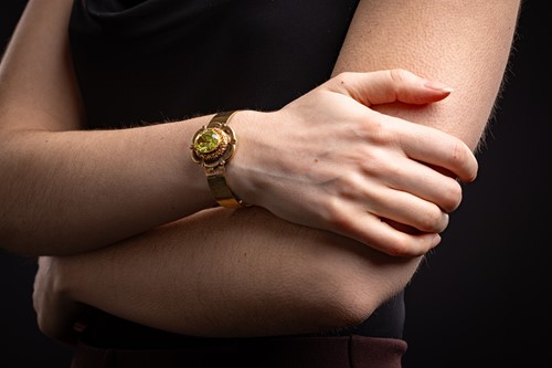 Lot A Victorian floral hinged bangle set with...