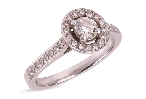 Lot 287 - A diamond-set ring, comprising a central...