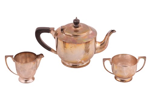 Lot 328 - An Art Deco three-piece tea service, circular,...