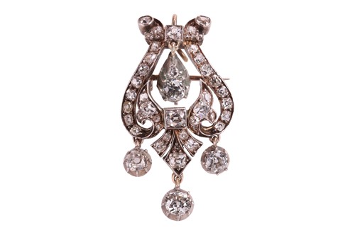 Lot 25 - A Victorian diamond lyre brooch/pendant,...