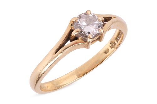 Lot 218 - A diamond single-stone ring, the six-claw set...