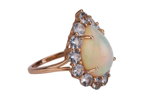 Lot 223 - A precious opal and aquamarine cluster ring in...