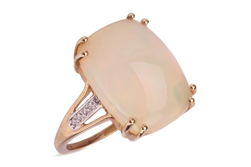 Lot 58 - An opal and diamond ring, the cushion-shaped...