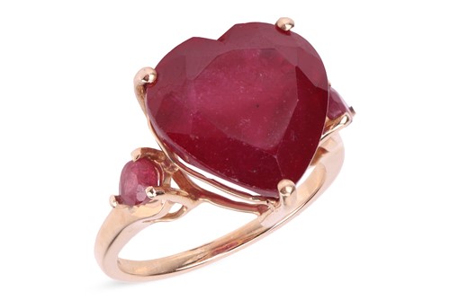 Lot 25 - A ruby ring, the heart-shaped glass-filled...
