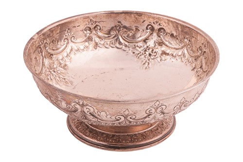Lot 335 - A late Victorian silver chased bowl, circular...