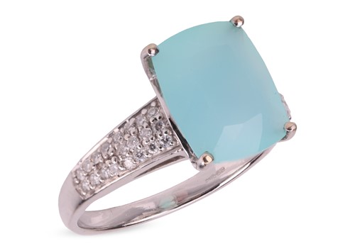Lot 225 - A blue common opal dress ring in 18ct white...