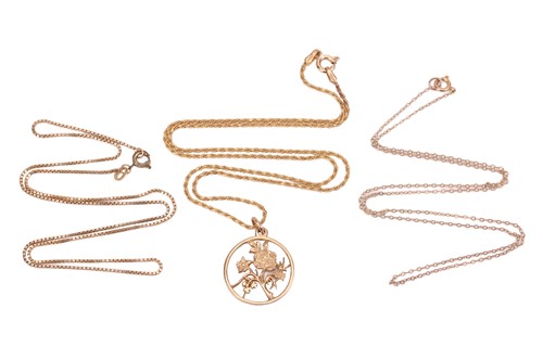 Lot 21 - A pendant on chain and two further chains; the...
