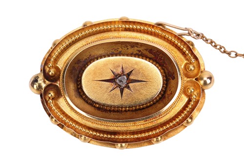Lot 8 - A late Victorian Etruscan-Revival brooch, the...