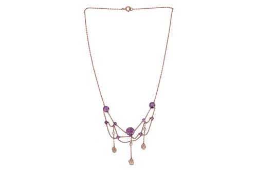 Lot 39 - An Edwardian amethyst and keshi pearl festoon...