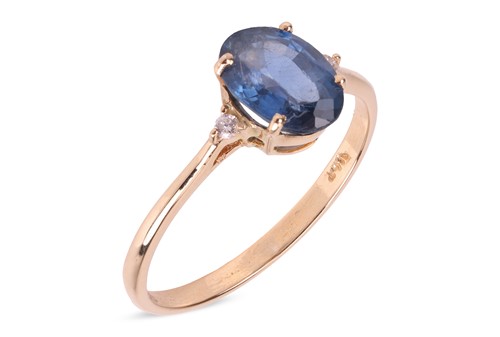Lot 271 - A sapphire & diamond-set ring, the central...