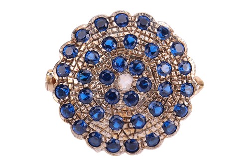 Lot 61 - A gem-set circular ring, featuring a rose-cut...