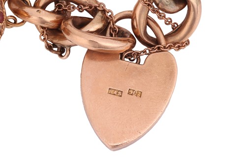 Lot 37 - A charm bracelet, comprising a series of...