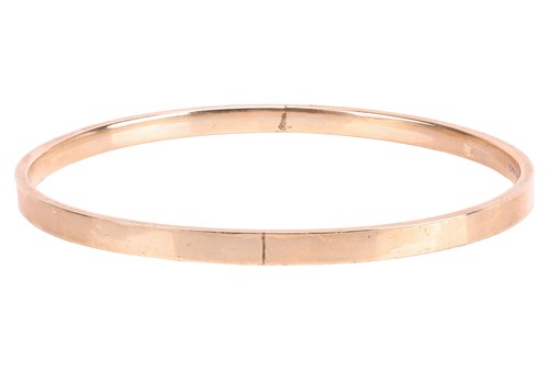 Lot 222 - A closed bangle, the hollow bangle measuring 4....