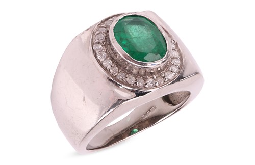 Lot 171 - An emerald and diamond ring in 9ct white gold,...