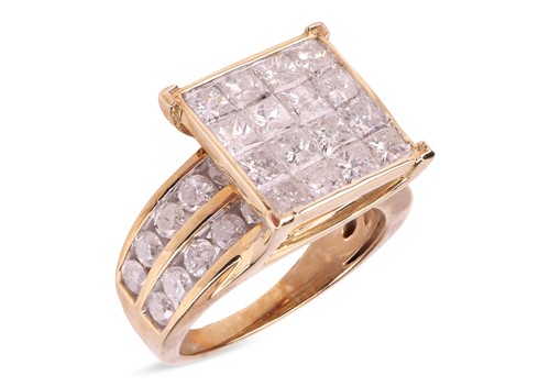 Lot 175 - A diamond-set dress ring, comprising a central...