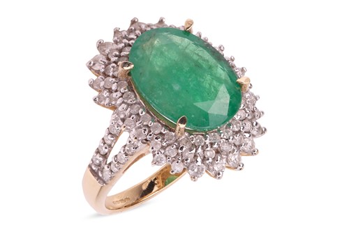 Lot 182 - An emerald and diamond cluster ring in 9ct...