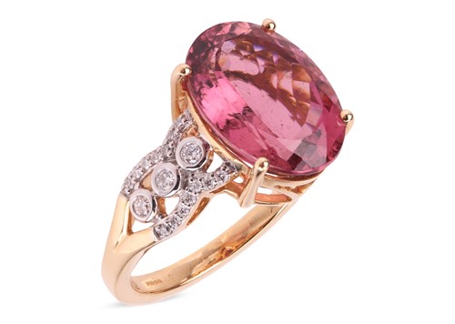 Lot 141 - A rubellite dress ring in 18ct gold, claw-set...