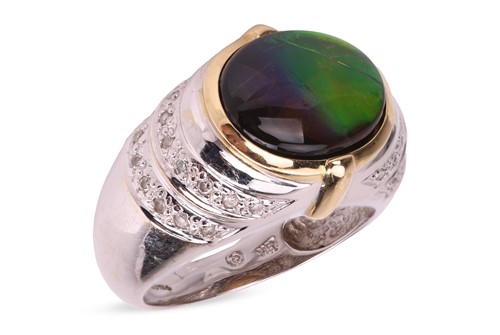 Lot 178 - An ammolite dress ring in 18ct gold, centred...