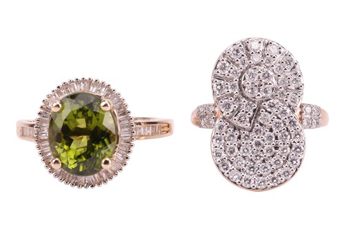 Lot 17 - Two rings; comprising a peridot and...