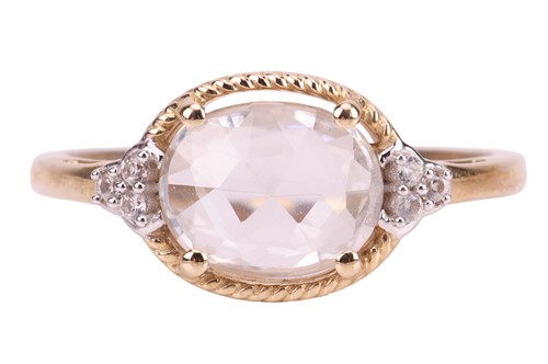 Lot 89 - A synthetic sapphire ring, featuring a central...