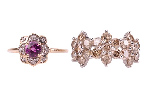 Lot 122 - Two rings; comprising a diamond-set floral...