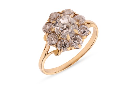Lot 13 - An old-cut diamond cluster ring, with an...