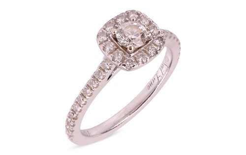 Lot 290 - A diamond cluster ring in 14ct white gold,...