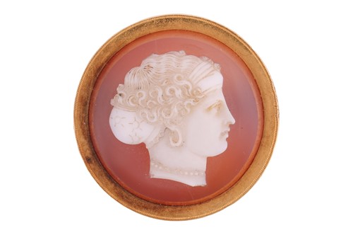 Lot 3 - An agate cameo brooch, the round agate panel...