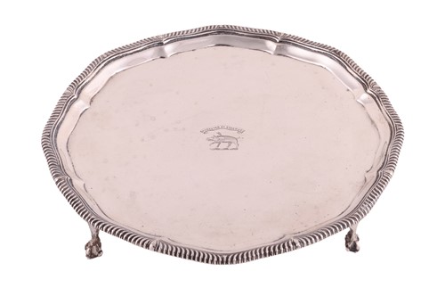 Lot 329 - A silver salver, shaped circular with...