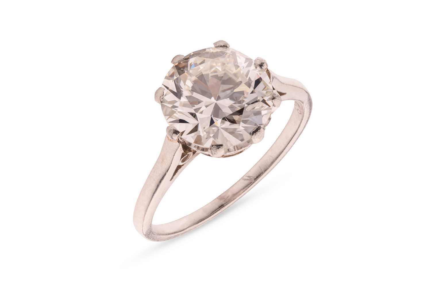 Lot An early 20th century diamond solitaire ring,...