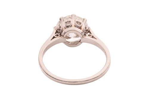Lot An early 20th century diamond solitaire ring,...