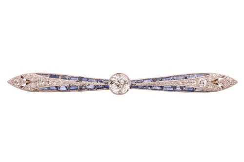 Lot 62 - An Art Deco sapphire and diamond bow brooch,...