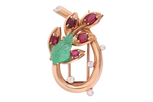 Lot Cartier - a spray clip brooch set with emerald,...