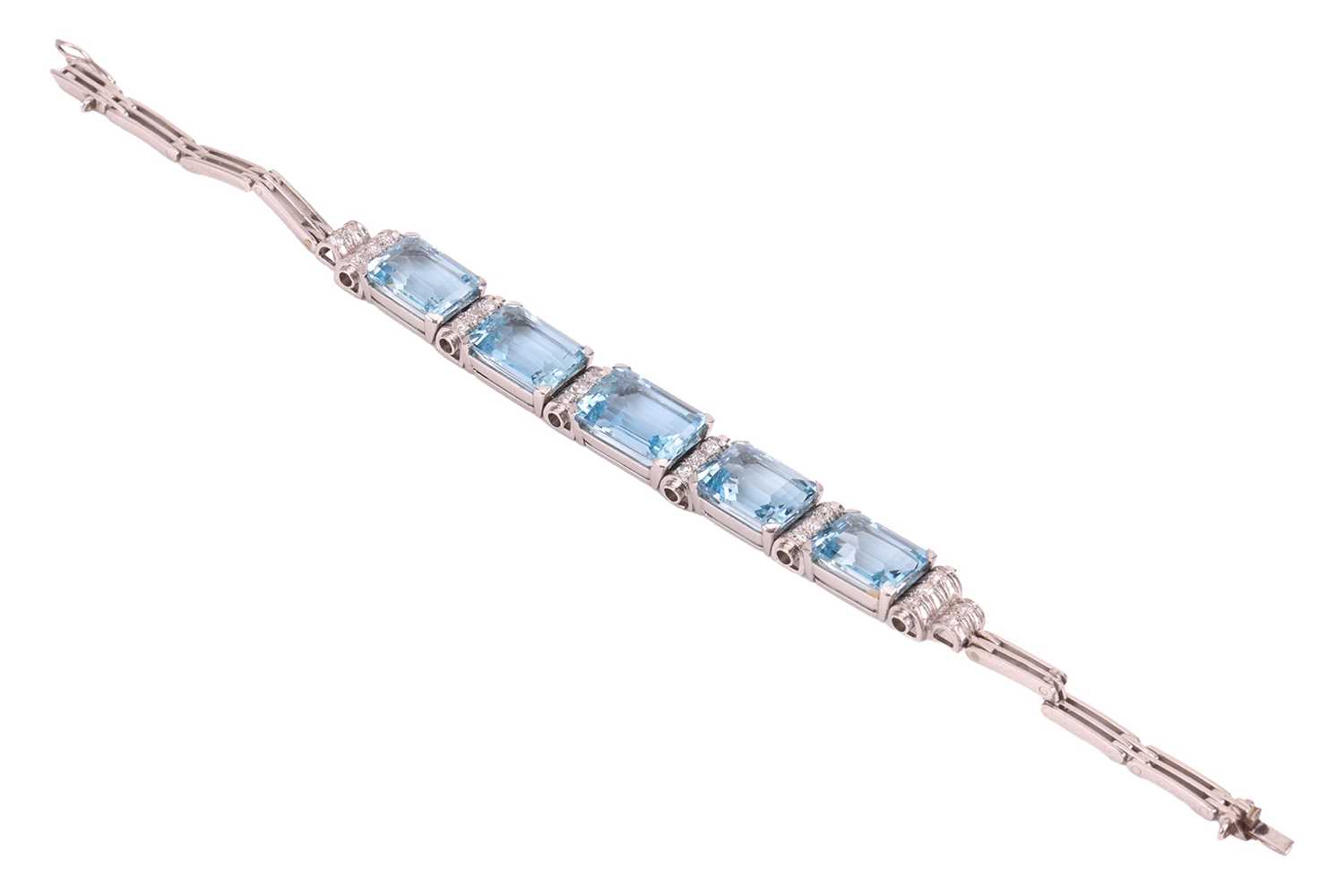 Lot An aquamarine and diamond link bracelet,...